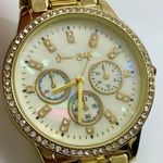 Jessica Carlyle  women’s watch 36mm gold tone pearl dial rhinestones running Photo 1