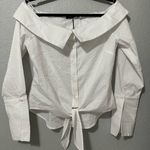 Romeo + Juliet Couture Elegant White Off-Shoulder Women's Top Photo 0