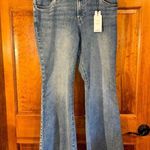 EXPRESS  Mid Rise light wash 70’s Flare Raw hem Size Lg S -NWTS Photo 0