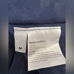 Reformation  Kelli Smocked Long Sleeve Floral Mini Dress in Elyse Navy sz Medium Photo 7