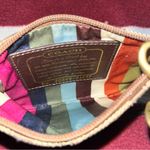 Coach  Signature brown Patent Leather Wristlet coin purse J0849-41637 
4x6” Photo 2