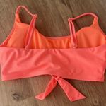Cute coral color swim top Size undefined Photo 1