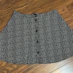 Divided daisy mini skirt Photo 0