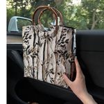 Elegant Floral Patterned Handbag with Bamboo Handles Black Photo 0