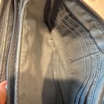 Stone Mountain USA LLC Gray Wristlet Clutch Bag with Gold Logo Detail Photo 6