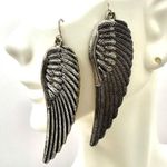 Silver tone angel wing earrings Photo 6