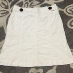 Lilly Pulitzer Lily Pulitzer white skirt. Size 8 has cheetah print buttons on front. Like new. Photo 0