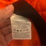 Nike therma fit women's large XL black oversized bomber jacket lined puffer oran Photo 14