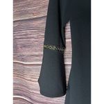 Calvin Klein Black Dress Size 2 Fitted with 3/4 Bell Sleeve With gold Rings. Photo 1