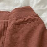 Adidas shorts Size XS Condition: NWT Color: pink Details : - Logo tab on side Photo 1