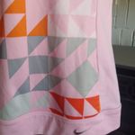 Nike Golf Tour Performance Dri Fit Pink and Orange Geometric Top Photo 1