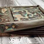 Hide Junky Metallic bronze and accents in turquoise and brown embossed crossbody purse Photo 12