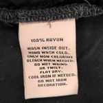 Juicy Couture  Black Blouse with Beaded Neckline Size Small Black V-Neck Blouse Photo 5