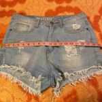 Machine ripped high rise Jean shorts Size 30 Photo 9
