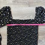 Reformation Pinto Smocked Floral-print Woven Top In Black Photo 5