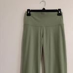 Nike NWT Yoga Dri-FIT Luxe Flared Pants Oil Green Medium Photo 3