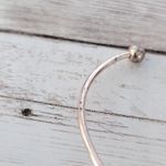 Very Light Shade of Rose Gold Tone Knot Bracelet Photo 4