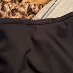 Nike  Women's Classic Dri Fit Black Sports Bra with White Logo Photo 4