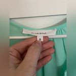 Olivaceous  Teal Top Photo 1