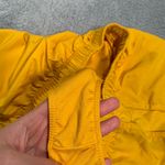 Nike  Women's Vibrant Yellow Athletic Shorts Photo 6