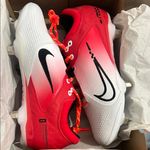 Nike Women's Red and White Cleats Photo 7