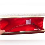 Glamorous Red and Gold Clutch with Dazzling Finish Photo 3