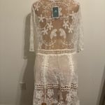 Eomenie. Vancavoo Beach Cover Up for Women Crochet Beach Dress Swimwear Lace Cover Ups Women's Beachwear Summer V Neck Floral Bikini Swimsuit Beach Sarongs See Through Hollow Out Dress(White) Photo 8