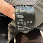 H&M  grey faux leather skinny leg pants size 4. In great condition! Photo 5