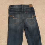 American Eagle  dark wash ripped knees super stretch skinny jeans Photo 3