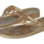 Tommy Hilfiger Women's Vedna Cutout Logo Jelly Thong Sandals- Gold- Size 6 Photo 0
