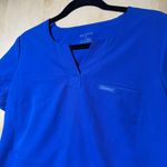 Jaanuu  Women’s 4-Pocket V-Neck Scrub Top Blue – Size M Photo 1
