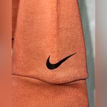 Nike  Dri-FIT Get Fit Lux Fleece sweatshirt size small EUC burnt orange Photo 4