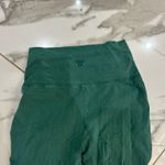 Aritzia  TNA Green Flare Leggings Split Photo 2