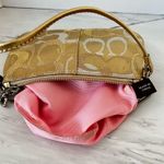 Coach Wristlet Zip Closure Gold And Silver Tone Treads Pink Lined Photo 6