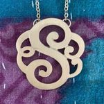 The letter “S” gold colored necklace Photo 0
