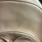 Shimmery Pink Bow Accent Backpack Purse Photo 1