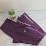 Mizuno  purple Womens running leggings with reflective zippers Photo 8