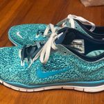 Nike - Green and blue free tr fit 4 size 8.5 Photo 1