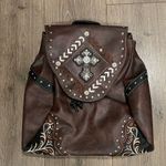 Brown Leather Backpack with Embellishments Photo 0