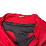 Lululemon Speed Up Short with a 4" inseam in Flamenco Red Swift Photo 5