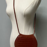 Charles and Keith  Semi Circle Croc-Effect Crossbody Bag Photo 0