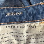 American Eagle  SZ 0 X-Long Jeggings Jeans Low-Rise Chewed Hems Whiskered Stretch Photo 9