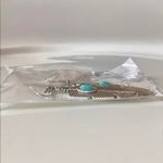 Western Style Feather Dangle Earrings Silver Photo 1