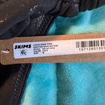 SKIMS Liquid Shine Swim Knotted Bikini Bottom Photo 1