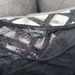 Bebe Black lace bodysuit with cut-out detail size L Photo 1