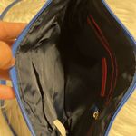 Tommy Hilfiger  Crossbody Blue color excellent condition no rips smells or stains Photo 8