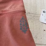 FP Movement Hot Shot Mini Skort NWT size Large in Petal Pink Stretch High Rise Photo 3