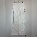 Bandier women's contrast run pants & Jacket (Set) in white Photo 1