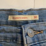 Levi's Levi’s mid length jean shorts Cuffed Light to medium wash Women’s size 30 Photo 2