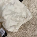 Torrid Fitted V-neck Novelty Sleeve Surplice Top Photo 6